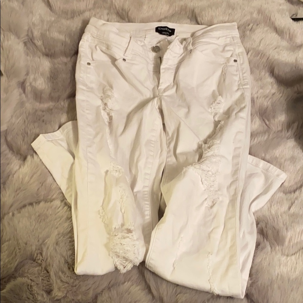 Bebe white ripped jeans
